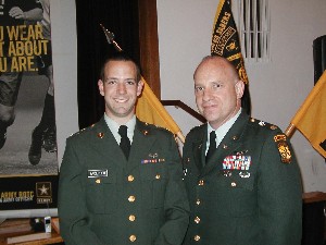 In May, Ryan Andersen (l), a mechcanical engineering student at the University of Rhode Island, is recognized as the recipient of the Cramer's Sabers Battalion award. Joining him is Lt. Col. Paul H. Yager, military science professor.